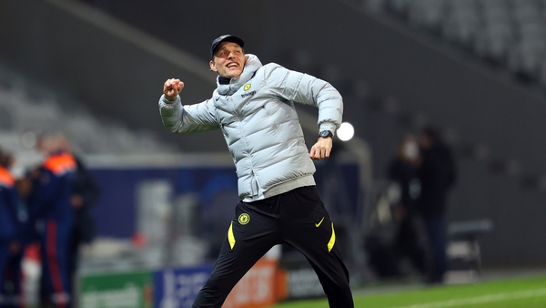 Chelsea boss Thomas Tuchel signals to the travelling fans in France