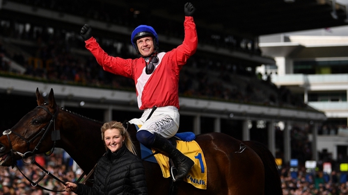 Jockey Paul Townend celebrates on Allaho with groom Ruth Dudfield