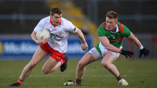 Peter Harte of Tyrone in action against David McBrien of Mayo