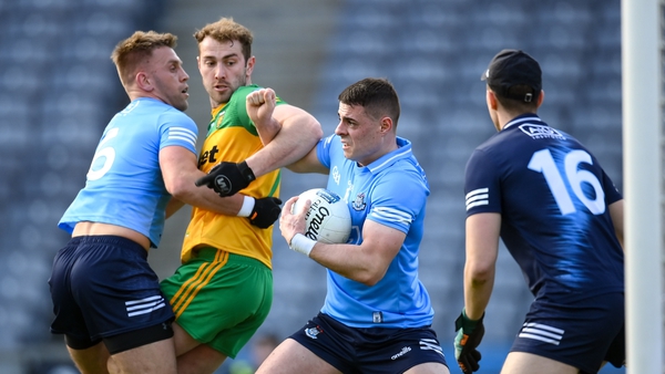 Brian Howard of Dublin with the support of team-mates Jonny Cooper, left, and goalkeeper Michael Shiel in action against Stephen McMenamin of Donegal