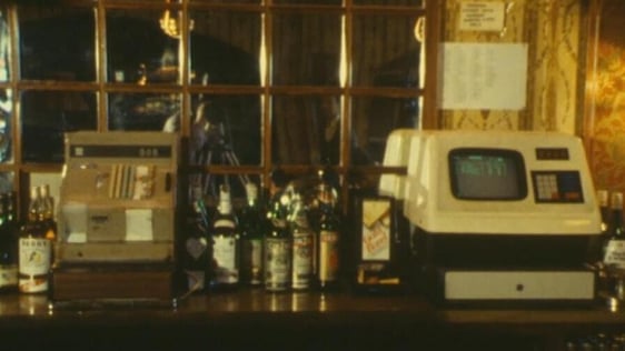 Old and new cash registers in pub (1982)