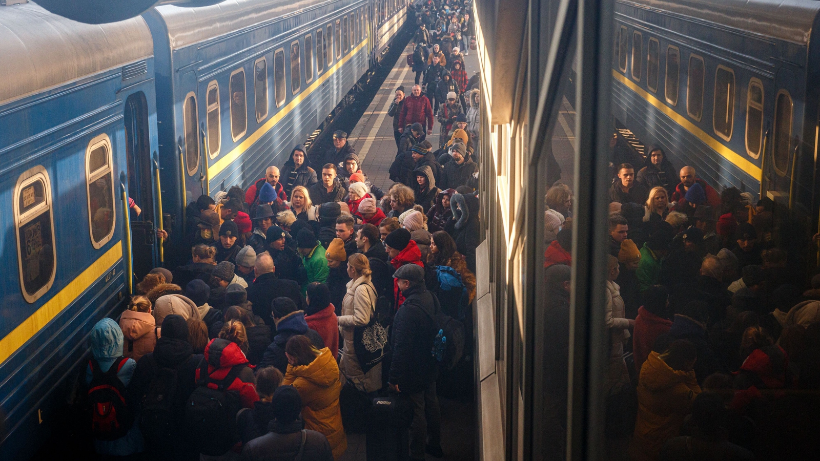 Image - People board an evacuation train at Kyiv central train station on 28 February