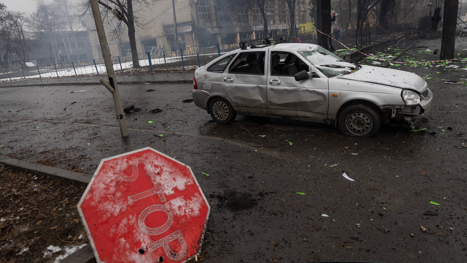 Image - Rubble and a damaged vehicle across the street from the Kyiv TV Tower on 2 March