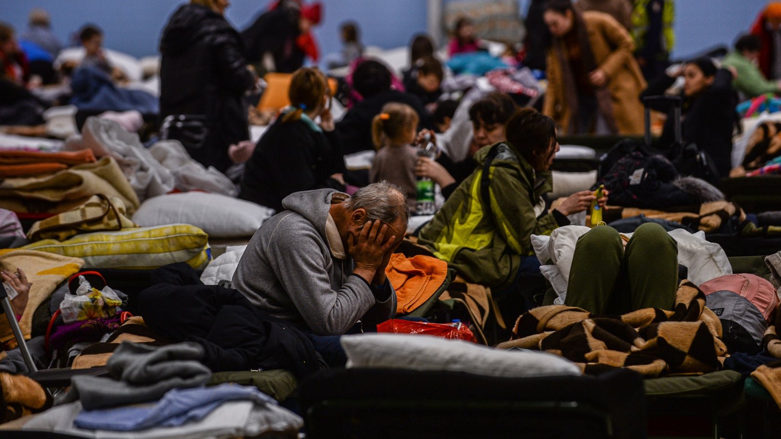 Image - A temporary refugee shelter in an abandoned supermarket houses Ukrainian people in Poland