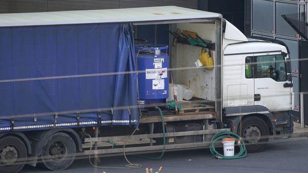 A lorry carrying a tank of hydrochloric acid, parked outside the Aquatics Centre at the Olympic Park in London, following a gas-related incident