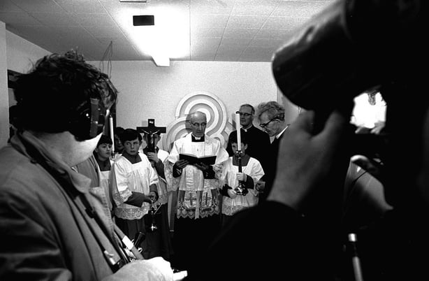 Fr Tomás Ó Concheannain at RnaG studios celebrating the opening of RTÉ Raidió na Gaeltachta on Easter Sunday 1972.