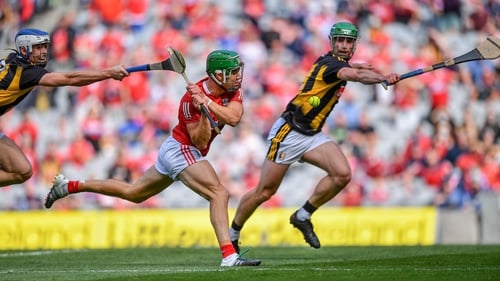 Huw Lawlor (L) and Tommy Walsh (R) try to block Alan Cadogan during the 2021 All-Ireland semi-final