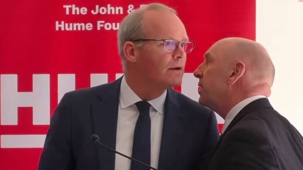 Simon Coveney had to leave a peace event, organised by the John and Pat Hume Foundation, in north Belfast as a result of the incident on 25 March