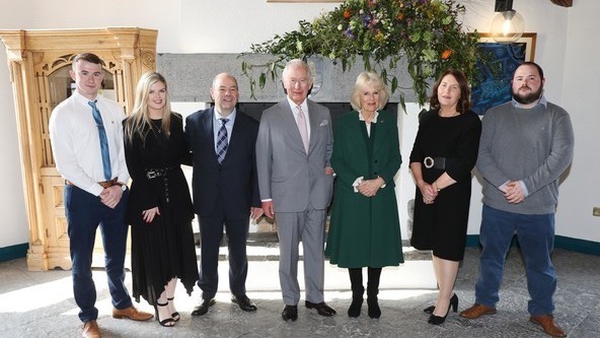 Britain's Prince Charles and Camilla the Duchess of Cornwall alongside the family of Ashling Murphy at Brú Ború Cultural Centre