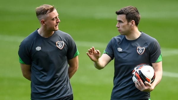 James Talbot (L) in conversation with Seamus Coleman during training