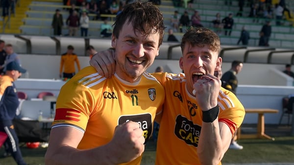 Domhnall Nugent (L) and James McNaughton celebrate Antrim's win