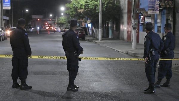 Police cordon off a crime scene in Colón, La Libertad department, El Salvador
