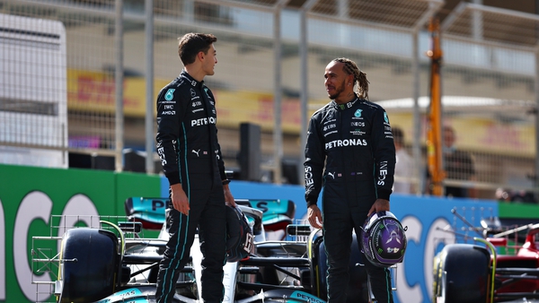 George Russell (L) and Lewis Hamilton