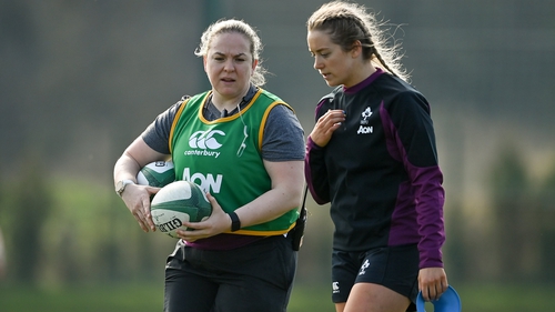 Briggs (left) speaks to Ireland back Stacey Flood at training