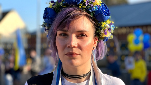 Olga Kiseleva wearing a Ukrainian flower crown at a protest at the Russian Embassy in Dublin