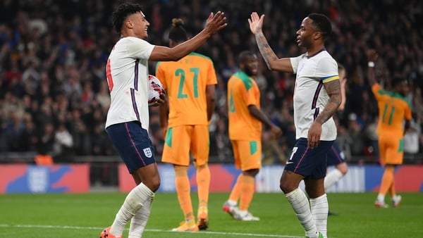 Raheem Sterling and Ollie Watkins celebrate after the Aston Villa man found the net