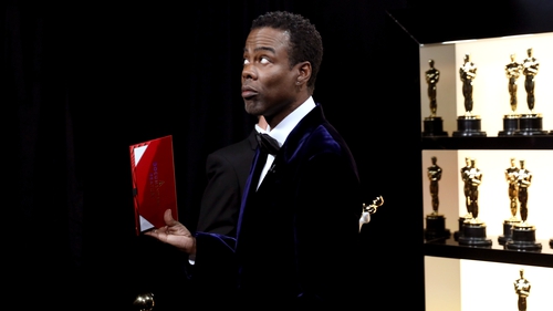 Chris Rock, seen here backstage at the Oscars before the chaos