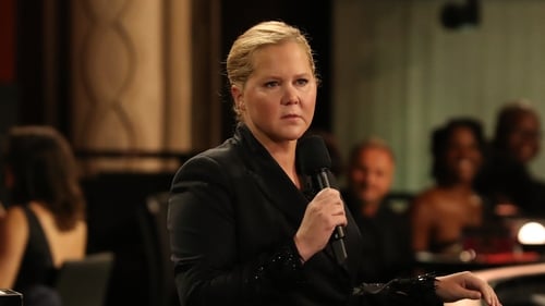 Amy Schumer, pictured presenting at the Oscars: "Still triggered and traumatized. I love my friend @chrisrock and believe he handled it like a pro"