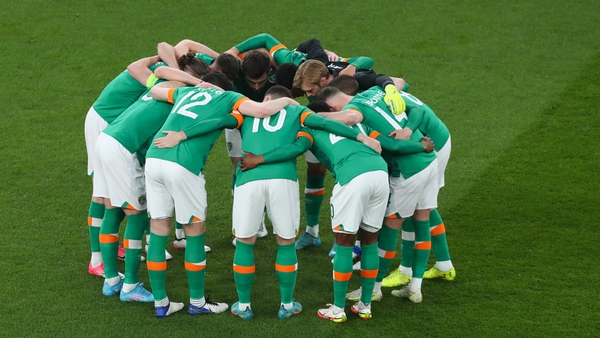 Ireland players form a huddle before the clash with Lithuania