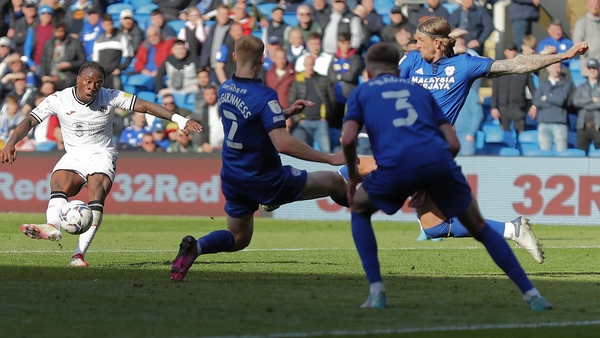Michael Obafemi of Swansea City scores