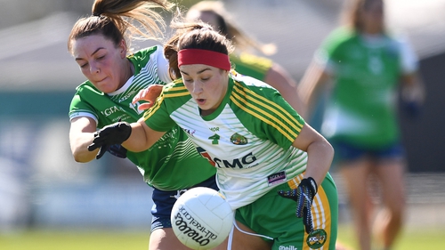 Becky Bryant of Offaly in action against Cathy Mee of Limerick