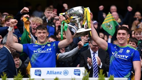Kerry joint captains David Clifford and Joe O'Connor lift the trophy