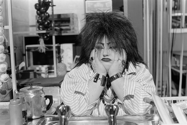 Irish actress Joyce Ward as Rita the cook from RTÉ Television's live late night chat show/comedy series 'Nighthawks', photographed on set in Studio 4 on 17 December 1991
