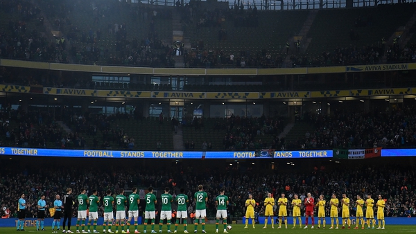 Ireland and Lithuania players line up for the anthems at the Aviva Stadium