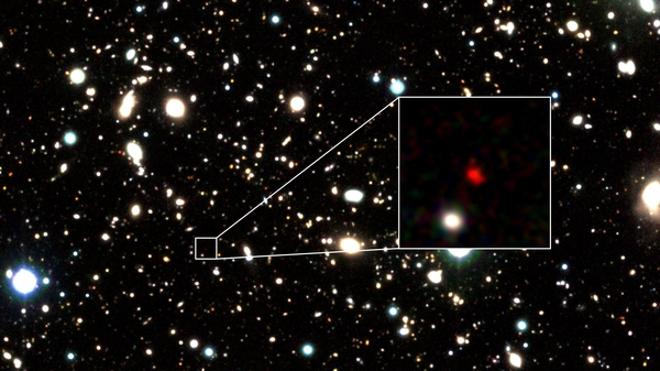 Galaxy candidate HD1 (object in red, appears at the centre of a zoom-in image)