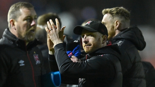 Dundalk head coach Stephen O'Donnell acknowledges the fans after the draw