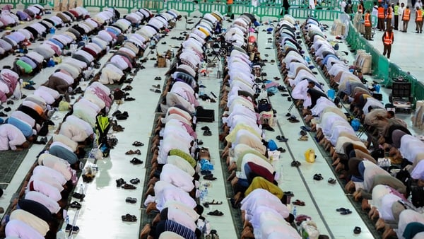 Muslims praying at the Grand Mosque in Mecca, Saudi Arabia