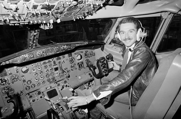 Broadcaster Vincent Hanley in the cockpit of a Boeing aeroplane, in a promotional shot for RTÉ Radio 2 (now RTÉ 2fm), taken at Dublin Airport in October 1980. Hanley was a DJ with the station at the time.    Photo by Des Gaffney