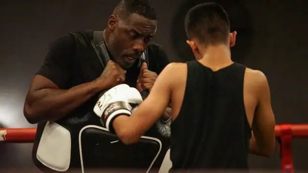 Idris Elba and Naeem from Idris Elba's Fight School (BBC/Workerbee/PA)