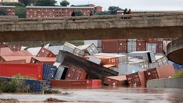 Containers fell over at a storage facility following heavy rain and strong winds in Durban