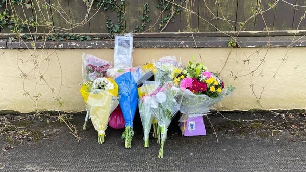 Flowers left at the scene where Aidan Moffitt was murdered
