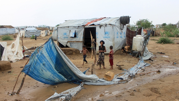 Tents damaged by torrential rain at a makeshift camp for Yemenis displaced by conflict, in the northern Hajjah province