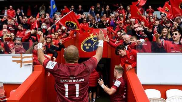 Simon Zebo is greeted by the Munster fans after the 34-32 aggregate win