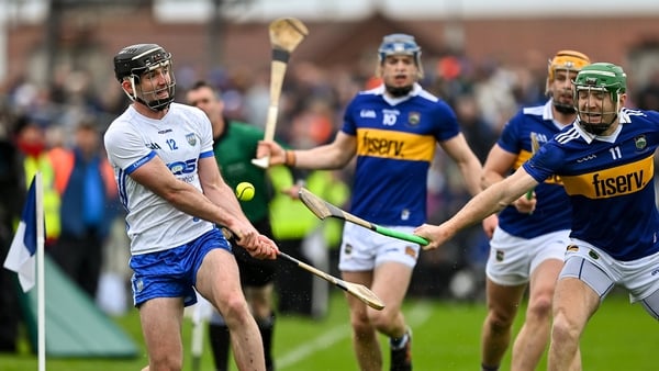 Patrick Curran of Waterford has a shot blocked by Noel McGrath of Tipperary