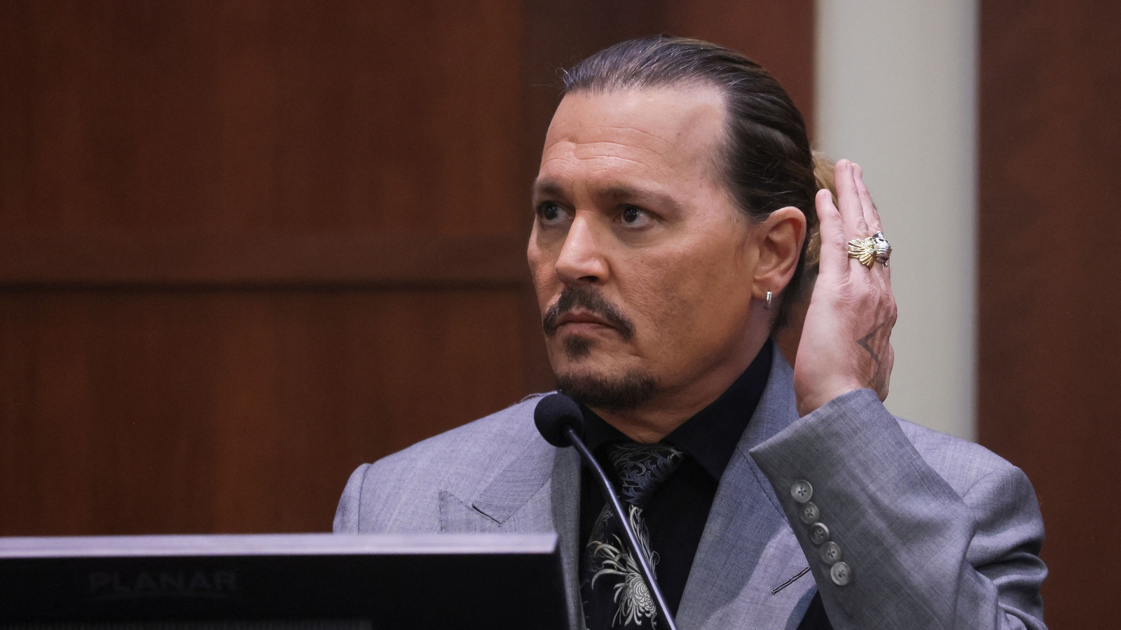 Depp court case ends second week with violent footage