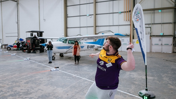 Jamie Kinsella of Carlow IT primed for his winning throw at the Irish National Final of Red Bull Paper Wings at Weston Airport