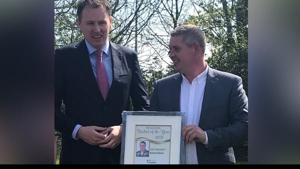 Co Cork farmer Dave Moloney, right, is presented with his Teagasc student of the year award by Minister for Agriculture Charlie McConalogue