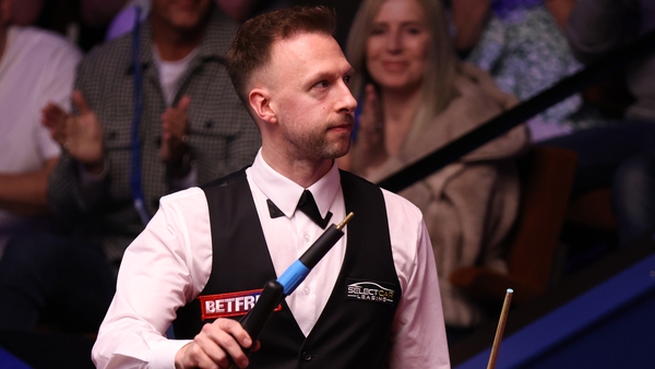 Judd Trump through to the last 32
