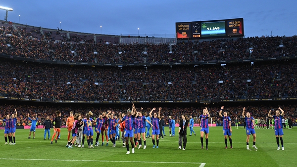 Barcelona players take the acclaim of the crowd at the Nou Camp