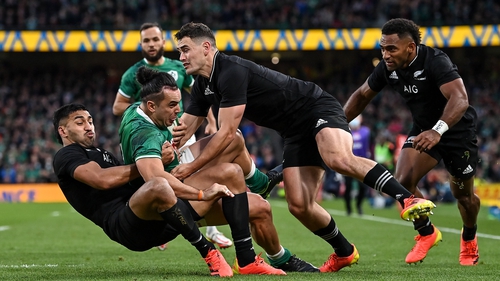 James Lowe is tackled by Reiko Ioane and Will Jordan last November's clash between Ireland and New Zealand