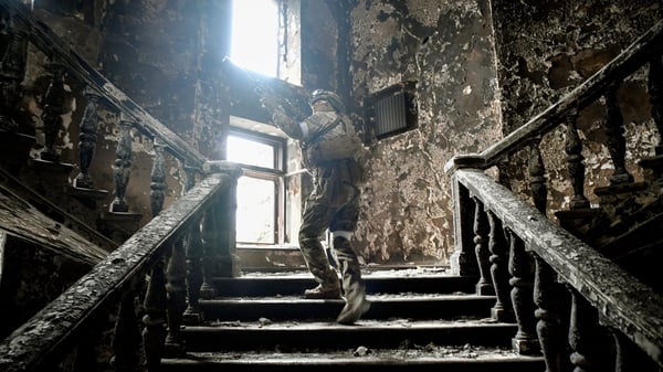 A Russian soldier inside the Mariupol drama theatre. Photo: Alexander Nemenov/AFP via Getty Images