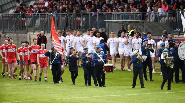 The Derry and Tyrone teams during the Ulster SFC pre-match parade in 2019