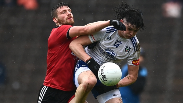 Gary Mohan of Monaghan beats Anthony Doherty to the ball