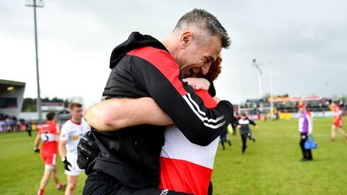 Rory Gallagher celebrates at final whistle with Conor Glass