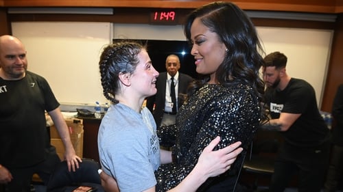 Taylor is congratulated by Laila Ali, retired boxer and daughter of Muhammad Ali