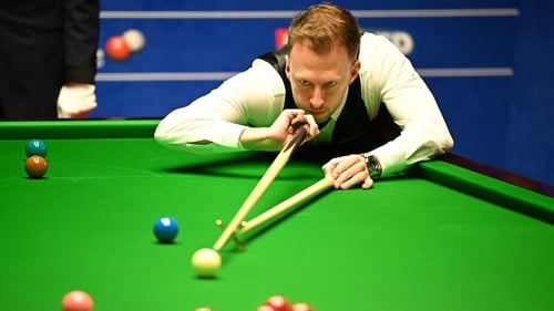 Judd Trump won Monday's early session 6-2 to narrow the gap to three frames